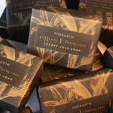 purify. brighten. glow.  Himalayan biodynamic turmeric and rare Kashmir saffron are the hero ingredients of this purifying bar, made using a blend of bitter apricot, coconut, and olive oils. Turmeric imbues its distinctive orange color and powerful anti-inflammatory properties, while saffron offers its natural skin lightening qualities to leave skin smooth, clear, and radiant. This is a truly multitasking treat suitable for the face, body, and hands.